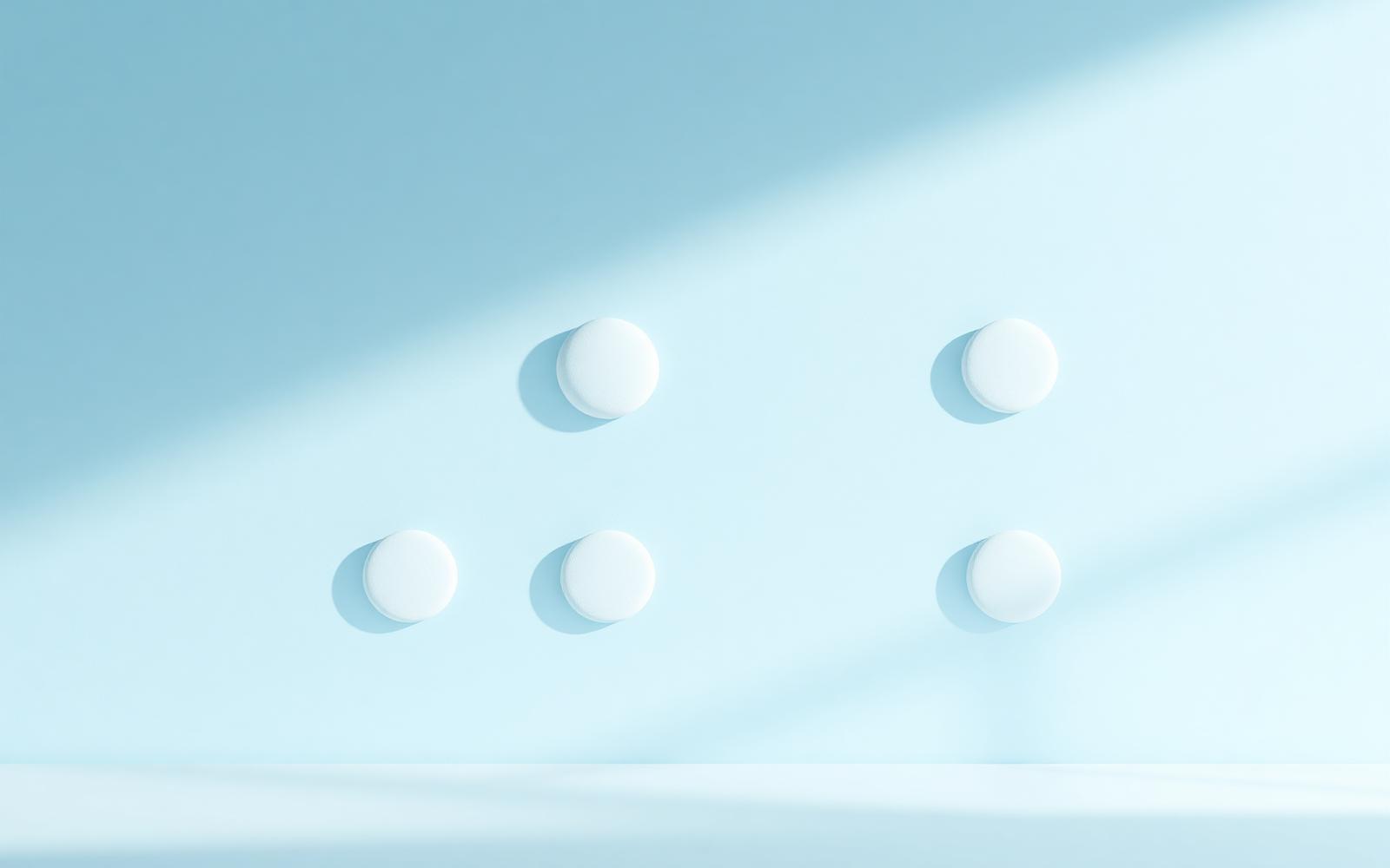 Soft floating circles arranged on a pale sky blue surface